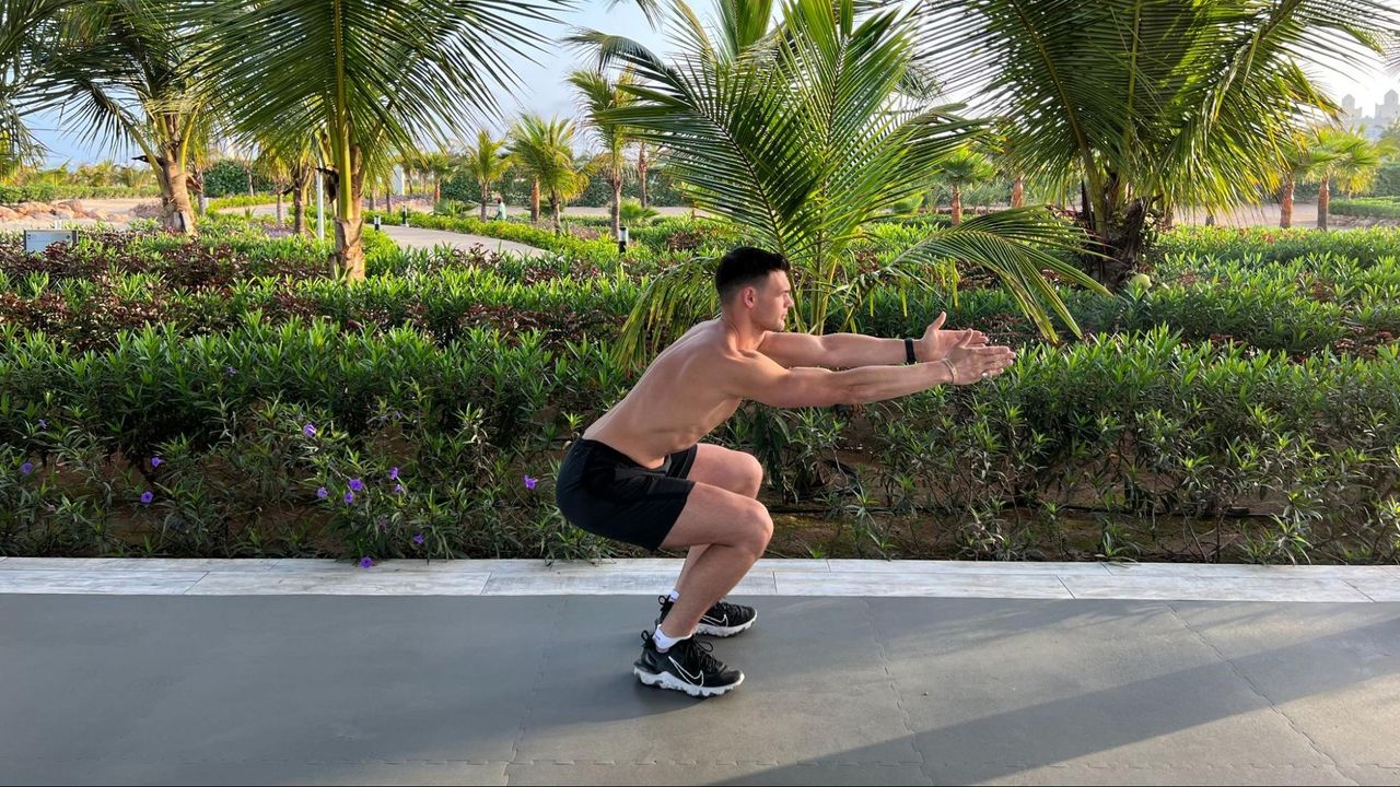 Sam Shaw performing a squat
