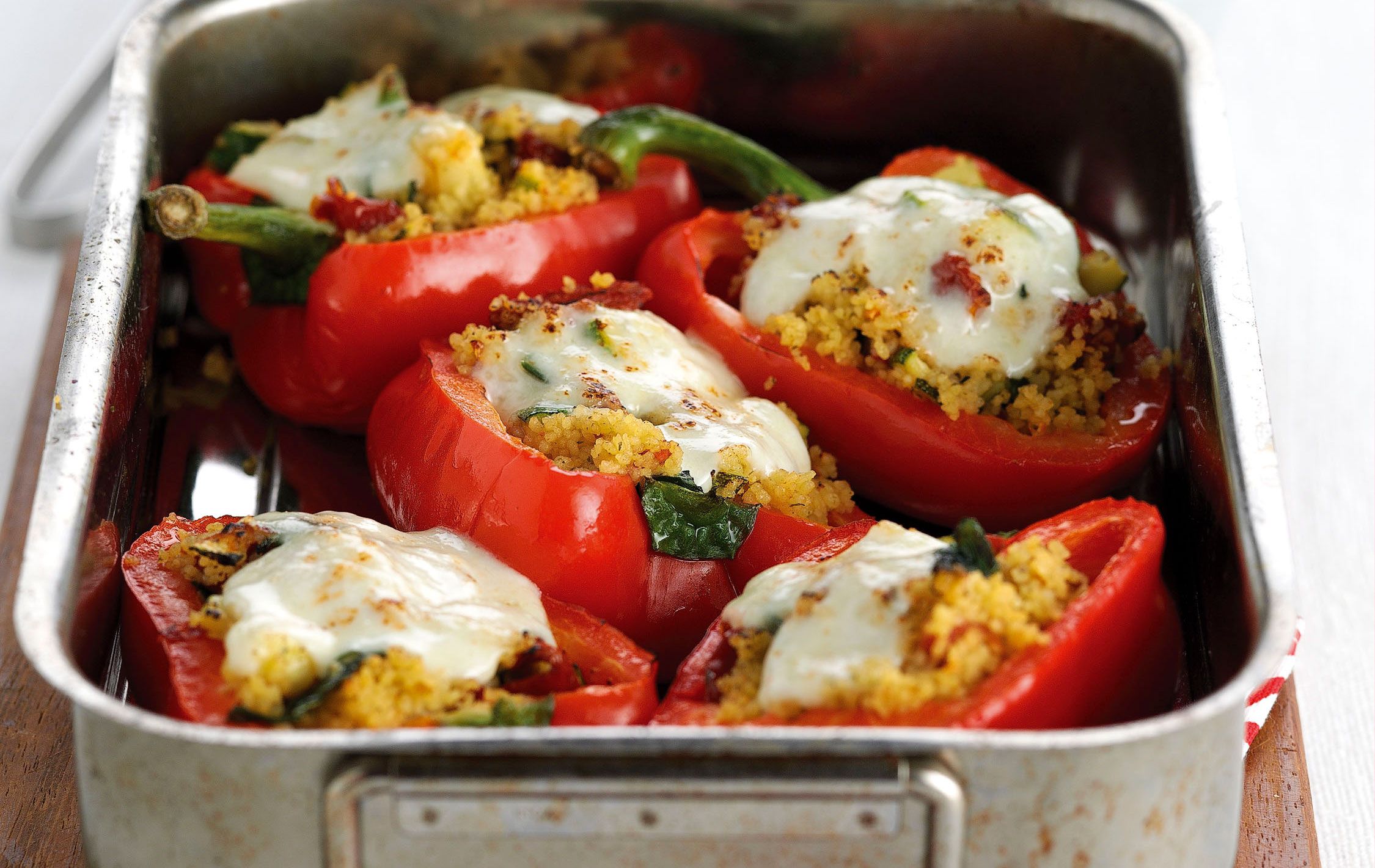 Stuffed peppers with couscous, courgette and mozzarella recipe
