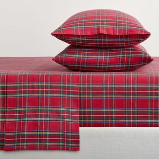 Stewart Plaid Flannel Sheet Set against a gray background. 