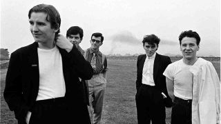 A group portrait of Simple Minds, near Edinburgh, Scotland, 27th August 1981. L-R Derek Forbes, Charlie Burchill, Kenny Hyslop, Mick MacNeil and Jim Kerr. 