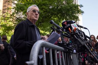 Robert De Niro speaks outside the trial of former President Donald Trump in New York.