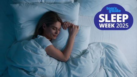 A woman with long dark hair falls asleep quickly in a comfy bed dressed with soft white linens