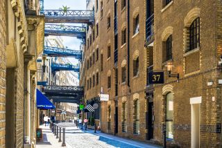 Street view of Shad Thames, a historic riverside street next to Tower Bridge in Bermondsey