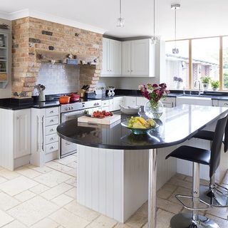 kitchen with worktop and white cabinet