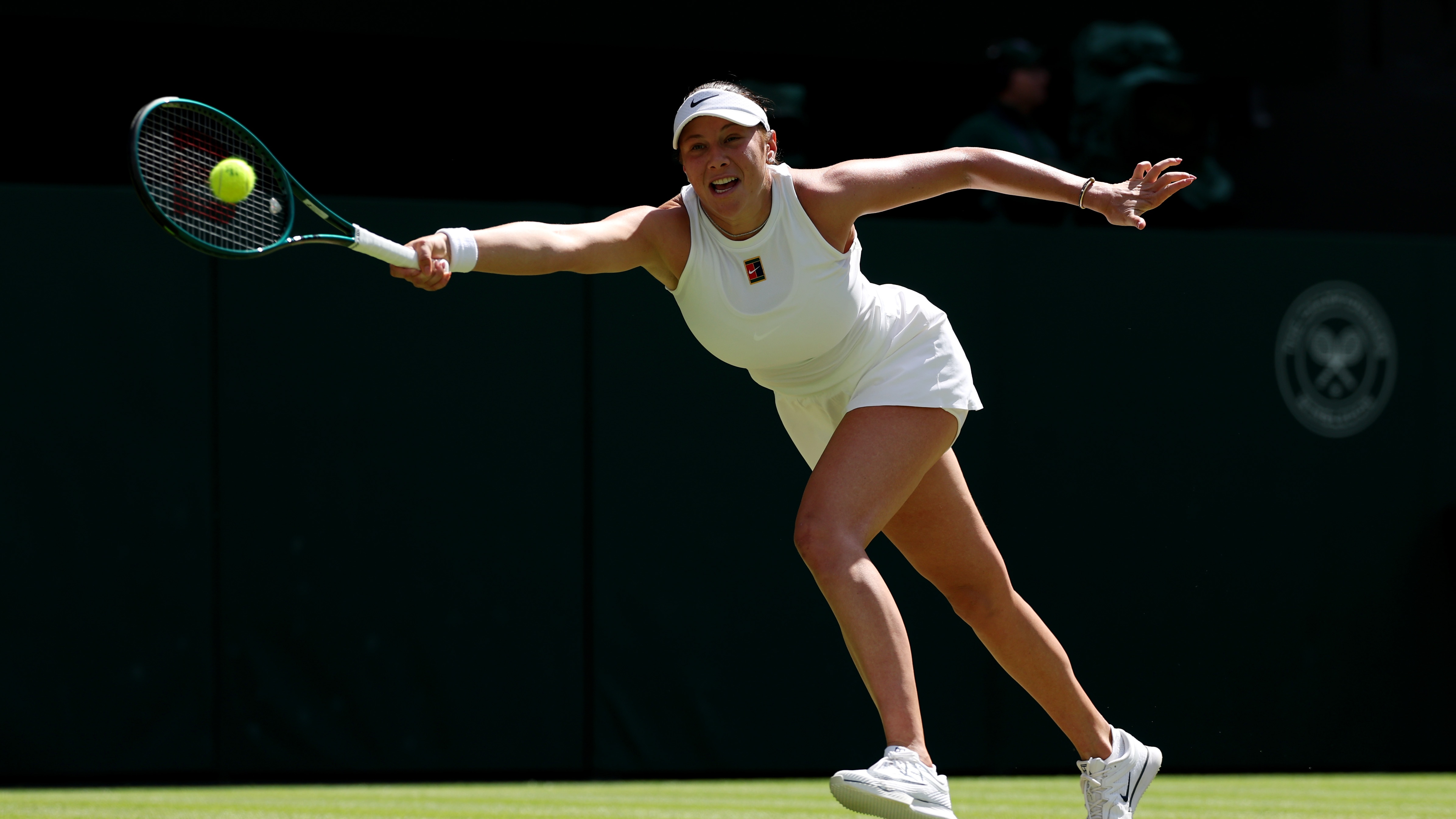 LONDON, ENGLAND - JULY 10: Amanda Anisimova of United States plays a forehand against Aryna Sabalenka during the Ladies' Singles semi-final on day eleven of The Championships Wimbledon 2025 at All England Lawn Tennis and Croquet Club on July 10, 2025 in London, England. (Photo by Julian Finney/Getty Images)