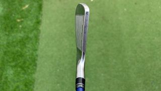 Photo of Bryson DeChambeau 5 iron at address