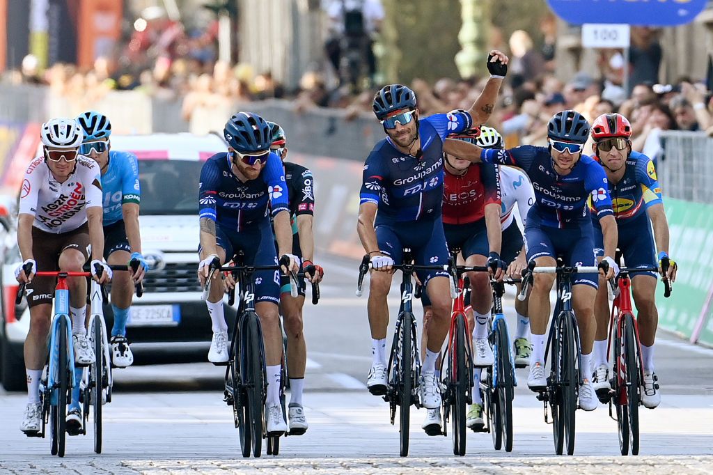 Thibaut Pinot (Groupama-FDJ) waves to fans as he crosses the line for the final race of his career