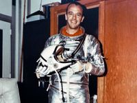 Astronaut Alan Shepard, the first American in space, poses here in his Mercury flight suit. 