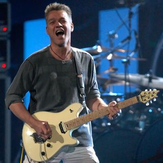 Eddie Van Halen performs onstage with Van Halen in East Rutherford, New Jersey on May 13, 2008