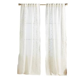 Sheer curtains with embroidered detailing
