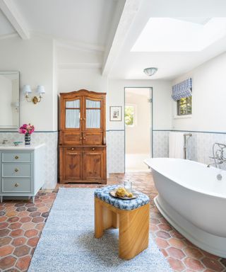 A bathroom with vintage-style decorative porcelain tiles