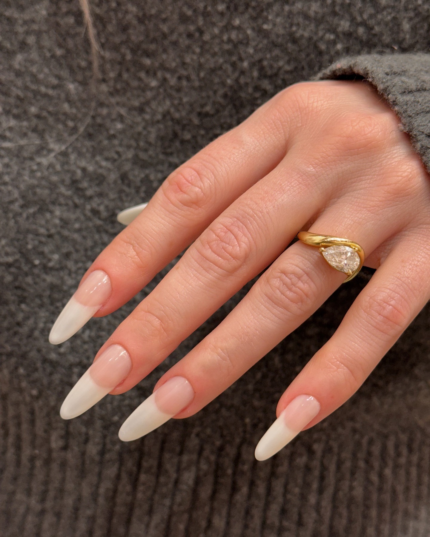 An off-white &quot;American&quot; manicure.