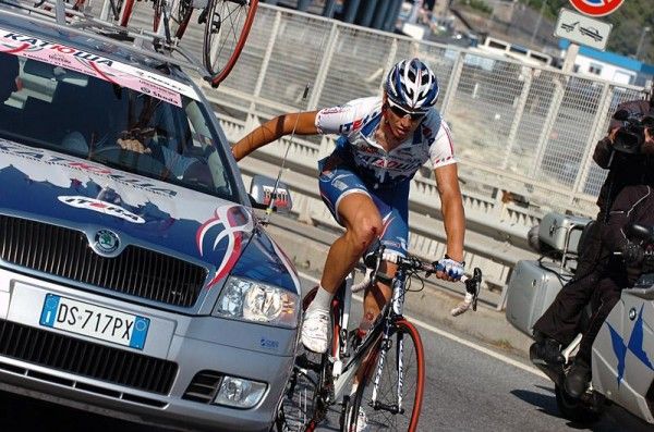 Filippo Pozzato (Team Katusha) seeks assistance from his team car after he crashed.
