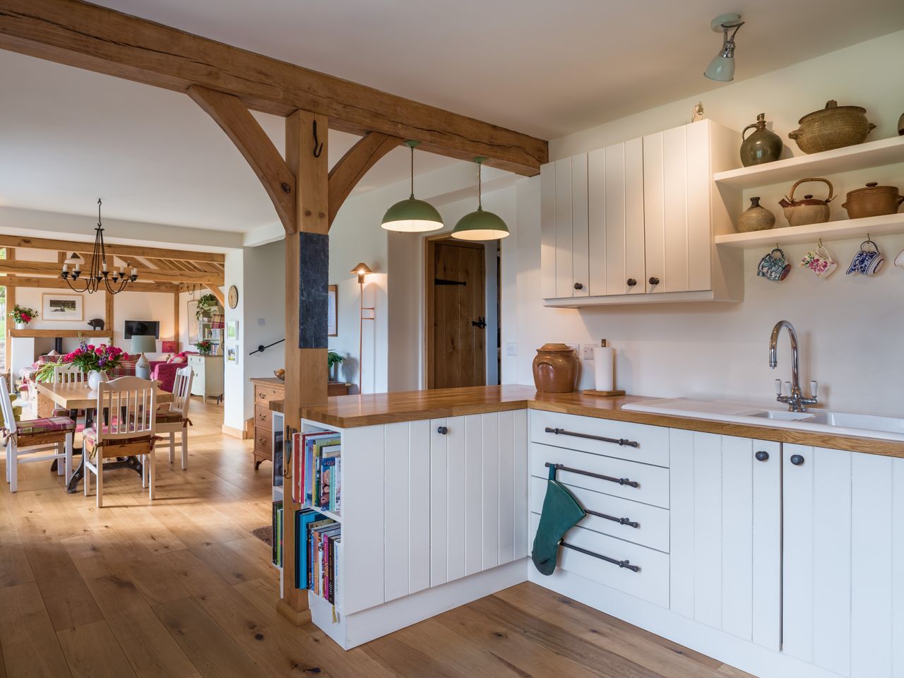 oak frame kitchen with white cabinets