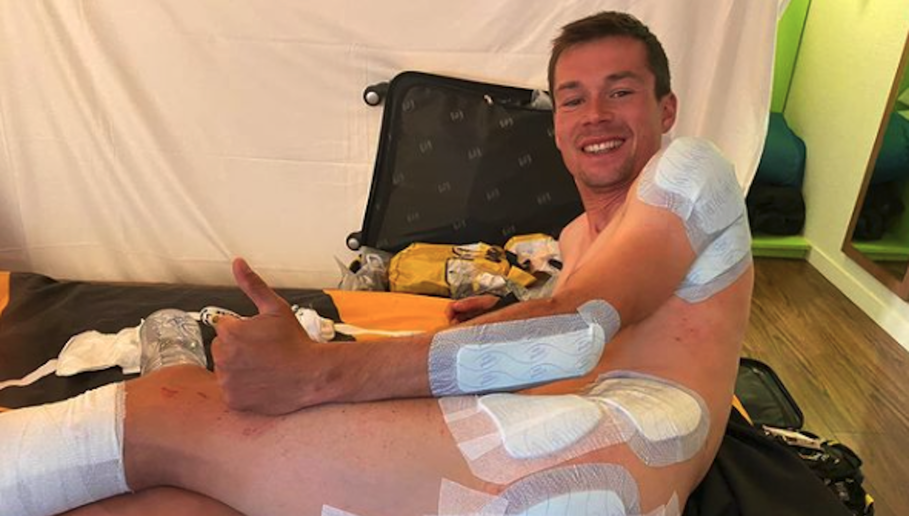 Primož Roglič bandaged up before the start of stage four of the Tour de France