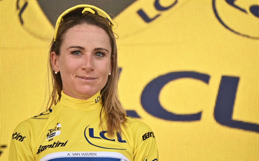 Movistar Teams Dutch rider Annemiek Van Vleuten celebrates her overall leader yellow jersey on the podium after the 8th and final stage of the new edition of the Womens Tour de France cycling race 1233 km between Lure and La Super Planche des Belles Filles on July 31 2022 Photo by Jeff PACHOUD AFP Photo by JEFF PACHOUDAFP via Getty Images