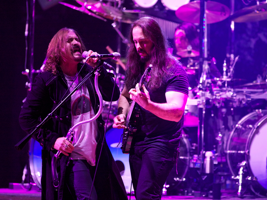 James LaBrie and John Petrucci (with Mike Mangini in back) give as good as they get