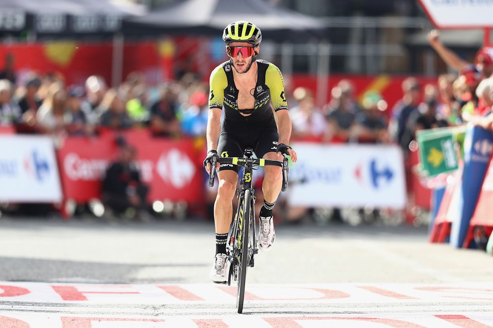 Adam Yates finishes stage 19 at the Vuelta after helping his brother, Simon, extend the overall lead.