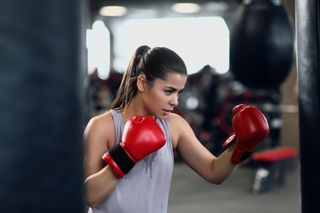 Fitness trends 2022: A woman boxing