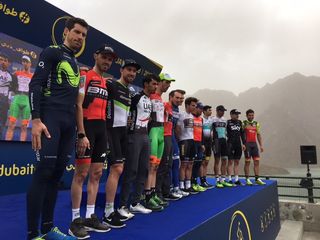 The rider representative stand on stage