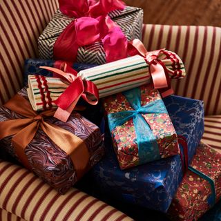Christmas presents wrapped in marbled paper