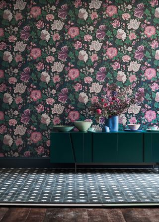 moody floral wallpaper in a dining room
