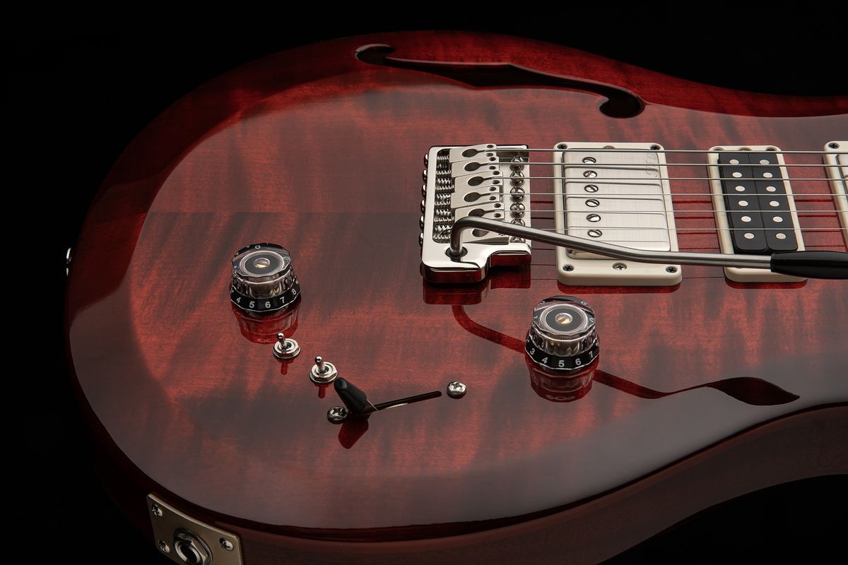 A photo of the PRS S2 Special Semi-Hollow in Fire Red Burst finish