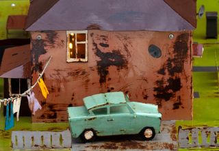 Grayson Perry Public art commission London, Inspiration Lives Here, miniature car beside miniature house