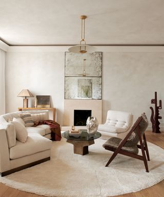 neutral living room with round rug