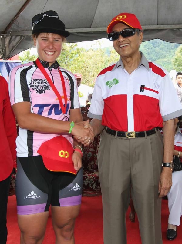 Nathalie Schneitter is congratulated after winning the women's stage 1