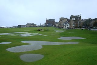 Puddles form on the Old Course