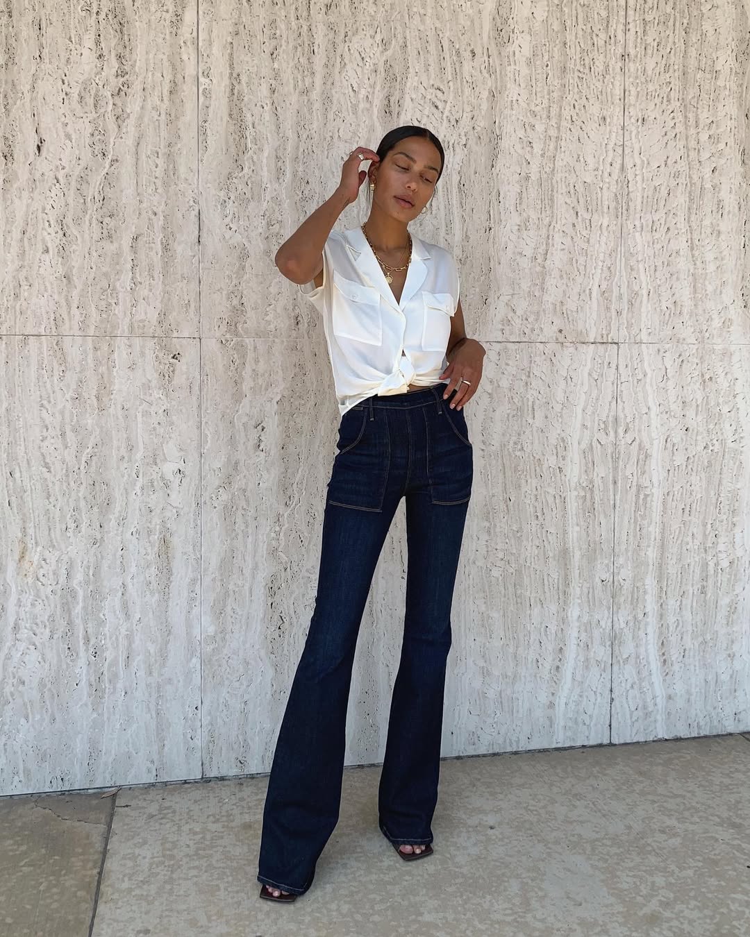 woman wearing chic fall 2025 denim trends