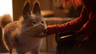 Sabine petting Loth-cat Murley in Ahsoka series