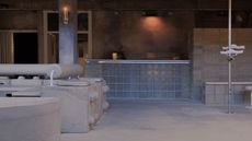 view of a new space in Dalston for intimacy, work and community, where concrete structures sit alongside rubber-cast seating