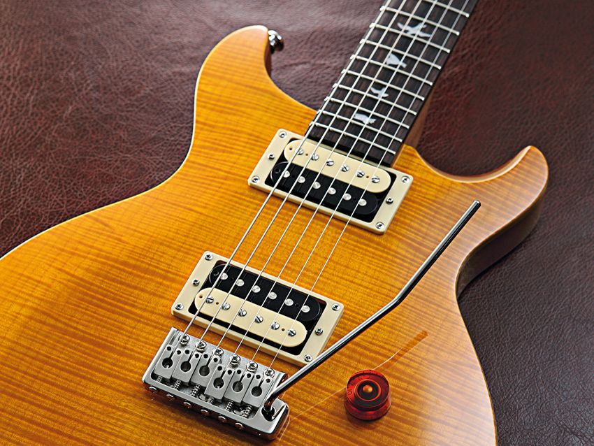 The guitar's top is gently contoured.