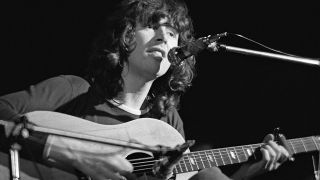 LONDON - Scottish singer Al Stewart performs live on stage at the Marquee Club in London in June 1972. (Photo by Fin Costello/Redferns)