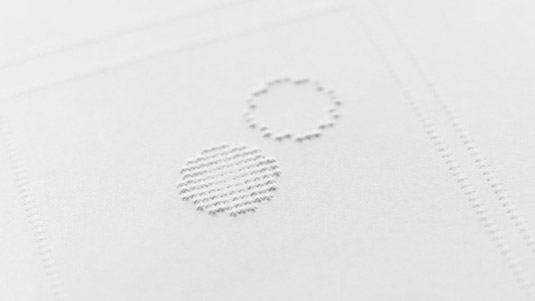 Two simple shapes in the braille comic close up