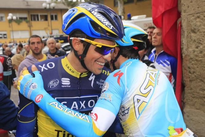 Old friends Alberto Contador and Paolo Tiralongo share a joke before Milano-Torino.