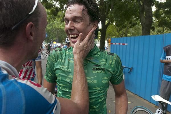 You owe me some beer for the lead-out man: Stage winner Kenny Van Hummel is congratulated by one of his Skil-Shimano teammates in Haikou.