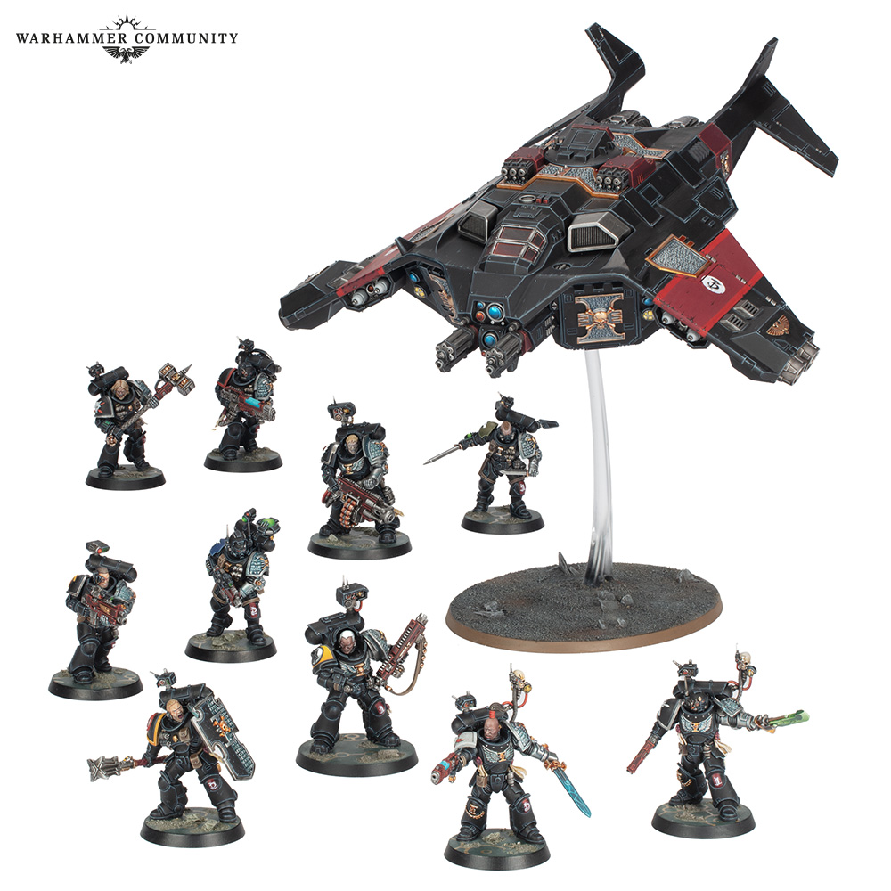 Deathwatch miniatures and vehicle on a plain background