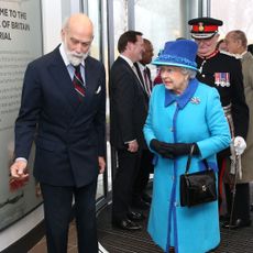 folkestone, england march 26 queen elizabeth ii greets prince michael of kent as she visits the national memorial to the few to open a new wing on march 26, 2015 in folkestone, england photo by chris jackson wpa poolgetty images