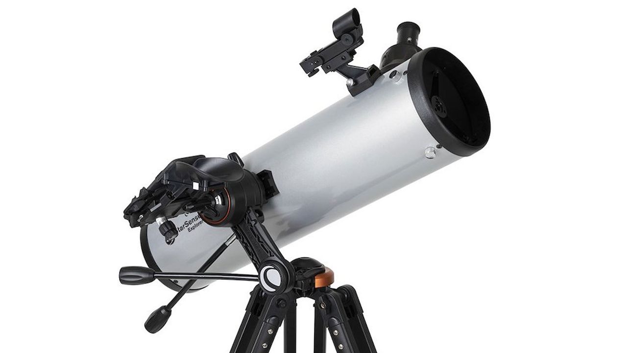 The Celestron StarSense Explorer DX 130AZ telescope pointing at the sky against a white background.