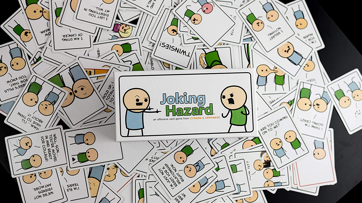 Joking Hazard cards scattered on a table