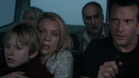 Nathan Gamble as Billy, Laurie Holden as Amanda, Jeffrey DeMunn as Dan, and Thomas Jane as David in Frank Darabont's The Mist