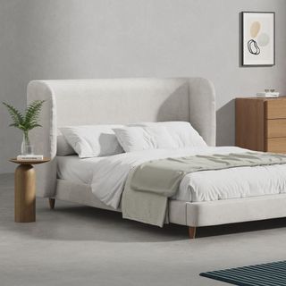 A grey upholstered bed frame from Simba