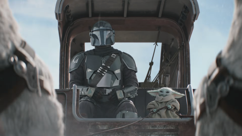 Mandalorian and Grogu riding in tauntaun-pulled speeder cart in Super Bowl ad