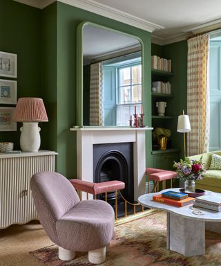 green living room with alcoves with both freestanding and fitted storage