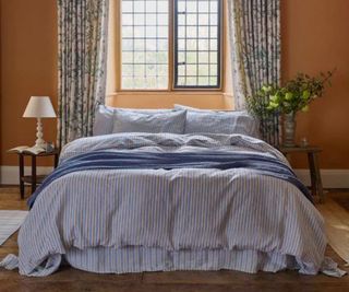 Bluebell Somerley Stripe Duvet Cover on a bed.