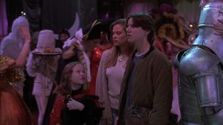 Thora Birch, Vinessa Shaw, and Omri Katz at a Halloween party in Hocus Pocus.