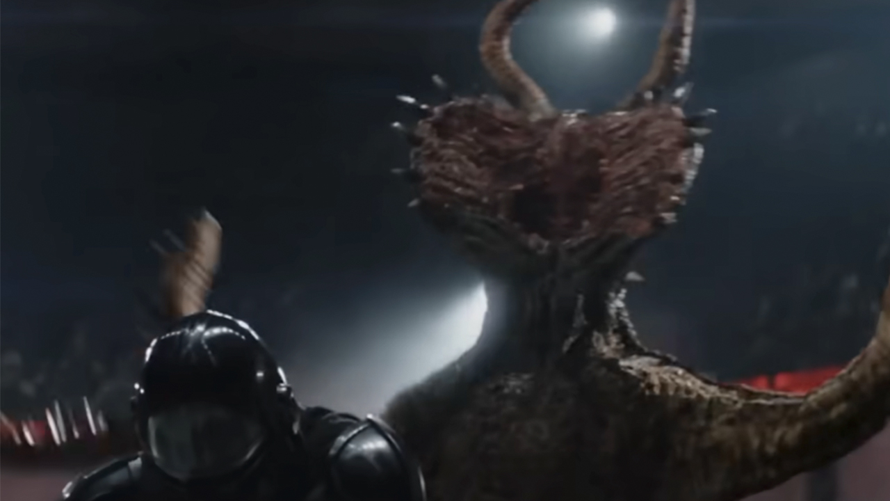 A scary looking monster from the Dejarik fight attacking the Mandalorian in The Mandalorian and Grogu